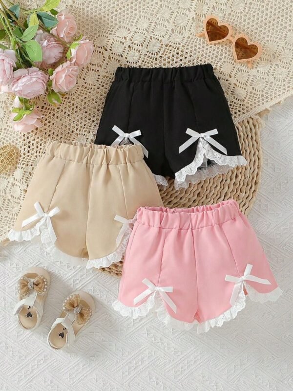  short fendu décoré de nœuds